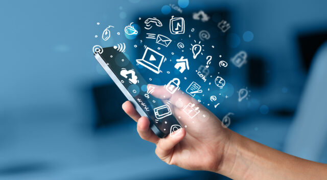 Hands show gesture symbol hashtag is viral, web, social media, network. Background is sunny urban sunset, concept for marketing, trending, blogging and internet themes.